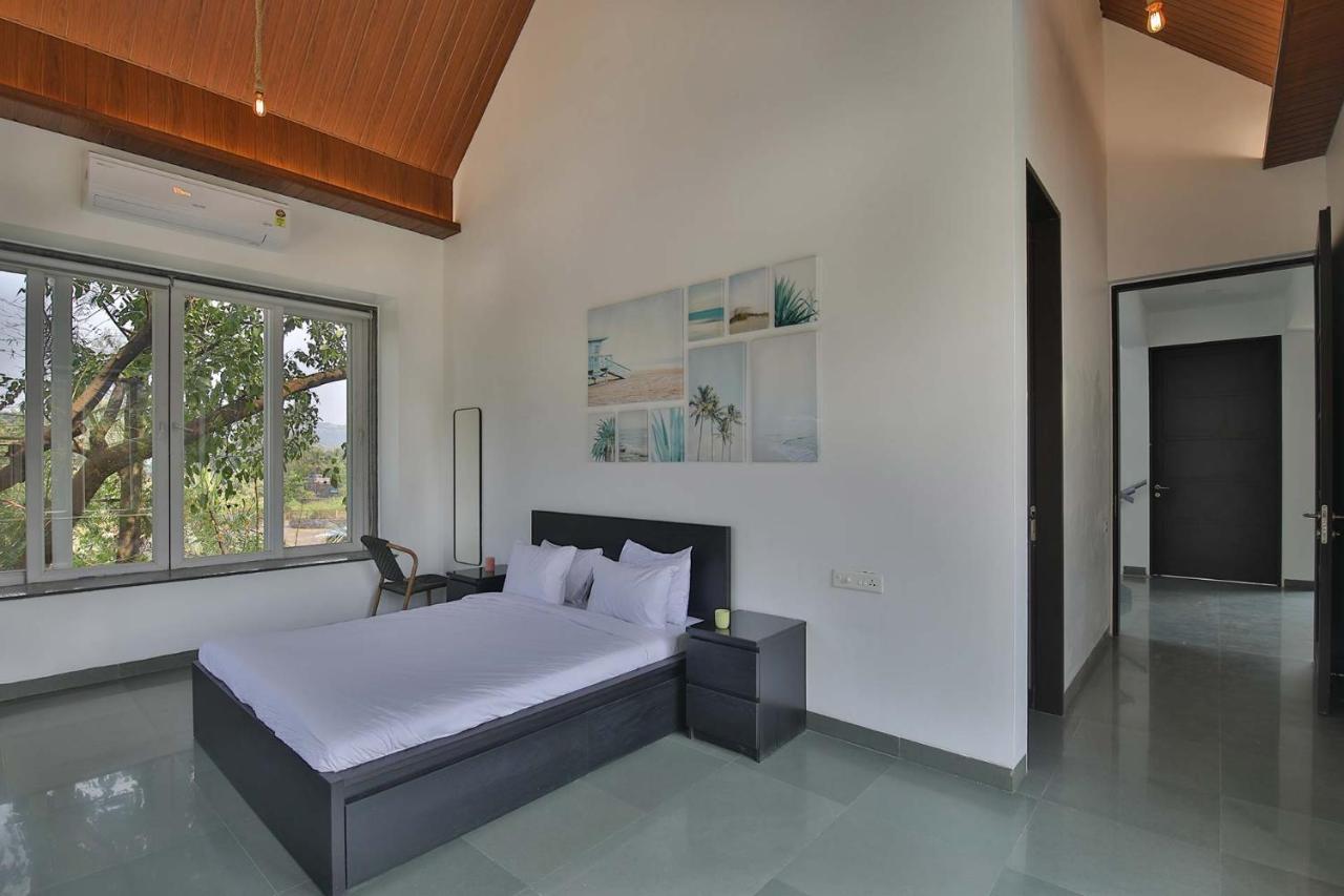 Twilight Grove By Stayvista - Pool- View Villa With Manicured Lawn, Contemporary Interiors & Home Theatre 卡尔贾特 外观 照片